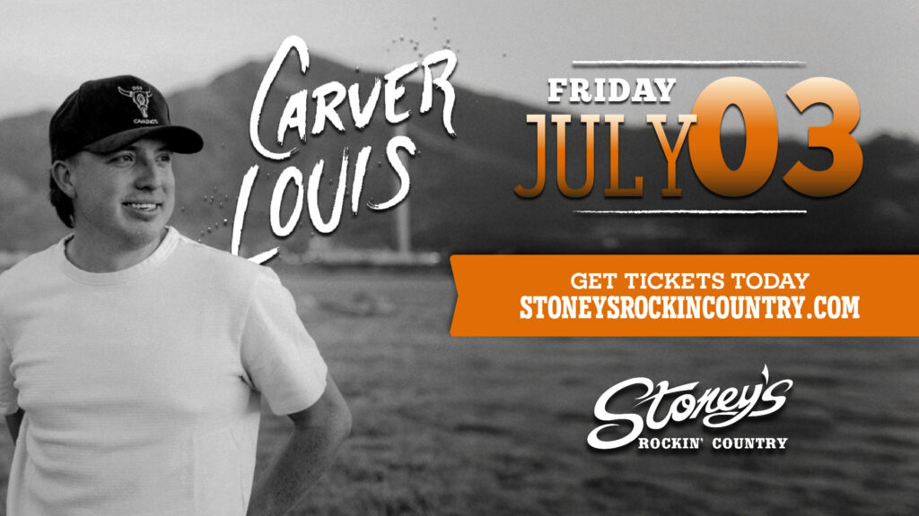 Carver Louis performing live on stage during a country music concert